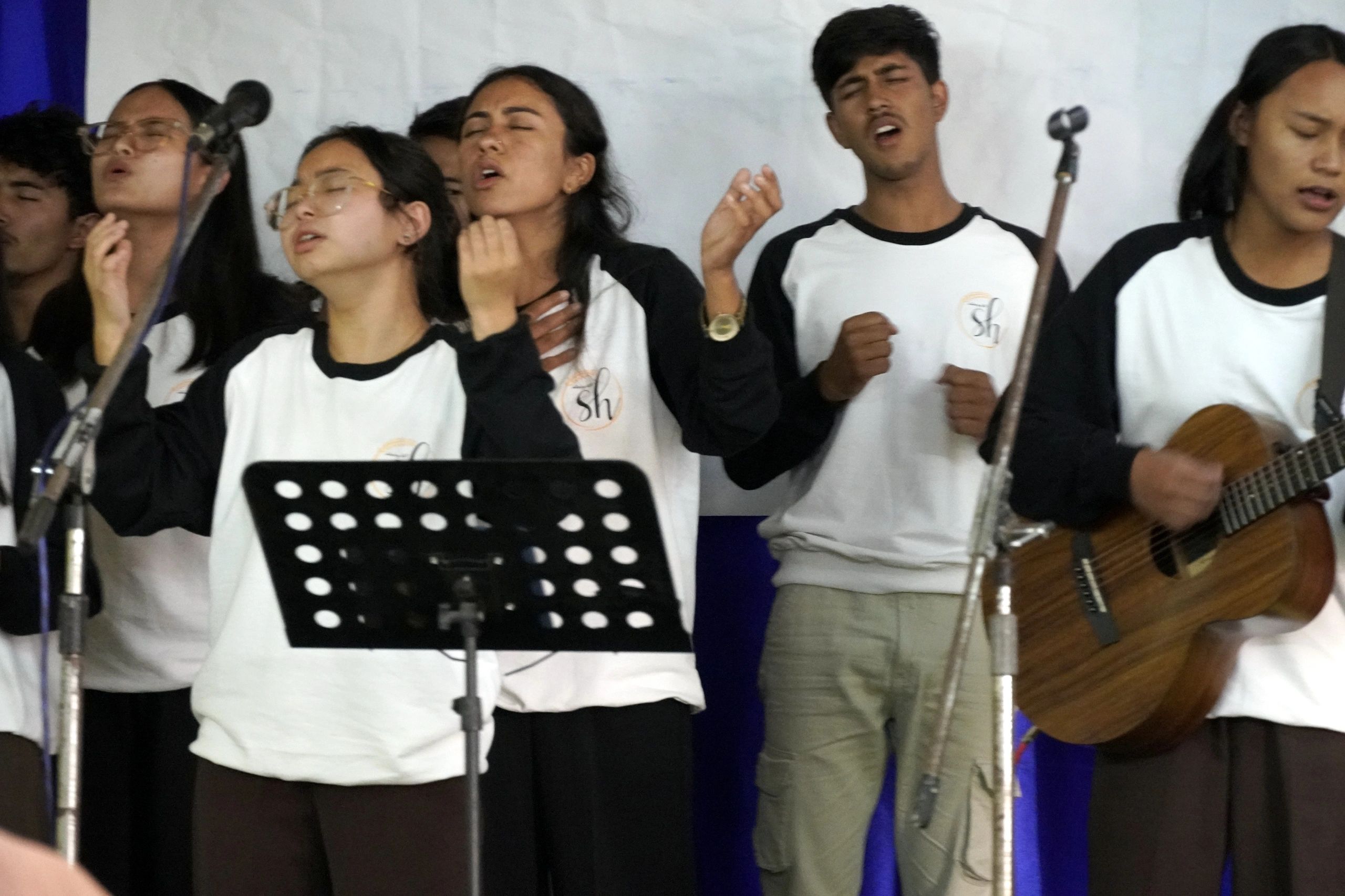 Young worship performers on stage